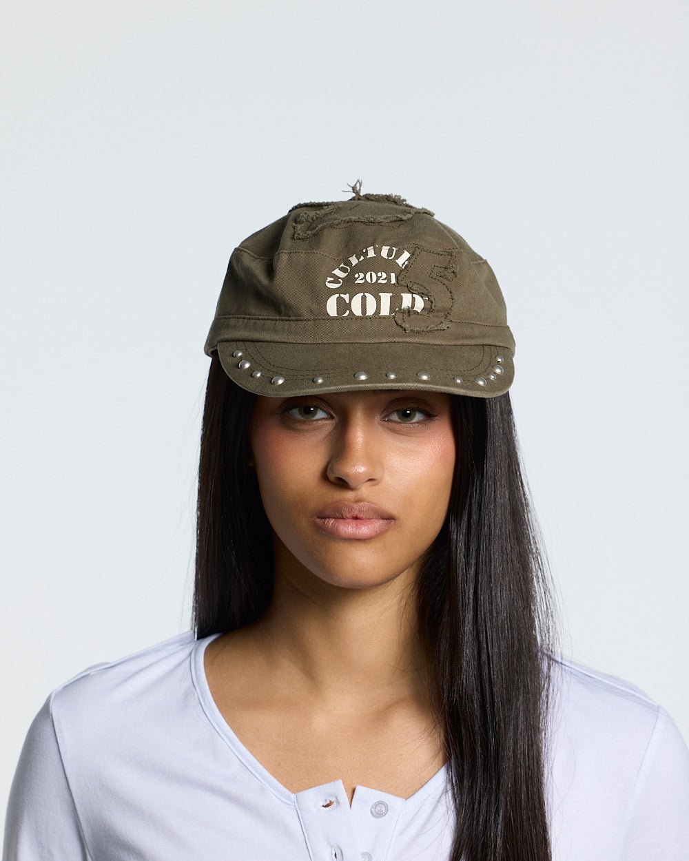BOSSMAN CAP BROWN - brown studded cap, front view on female model - Cold Culture #woman