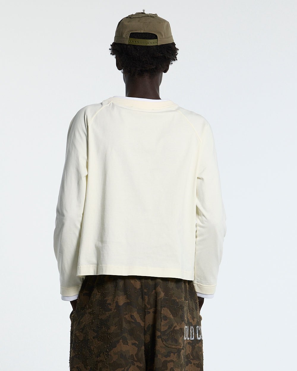 CAPUCCINO LONGSLEEVE CREAM - cream longsleeve tee, back view on male model - Cold Culture