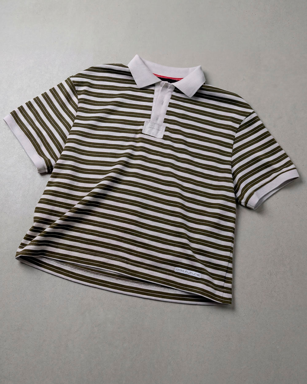 COURT FIELD KNIT POLO GREEN - green striped knit polo, flat lay - Cold Culture