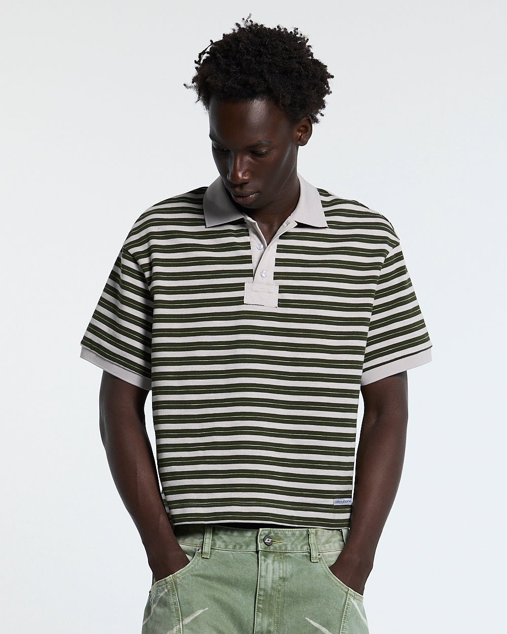 COURT FIELD KNIT POLO GREEN - green striped knit polo, front view on male model - Cold Culture