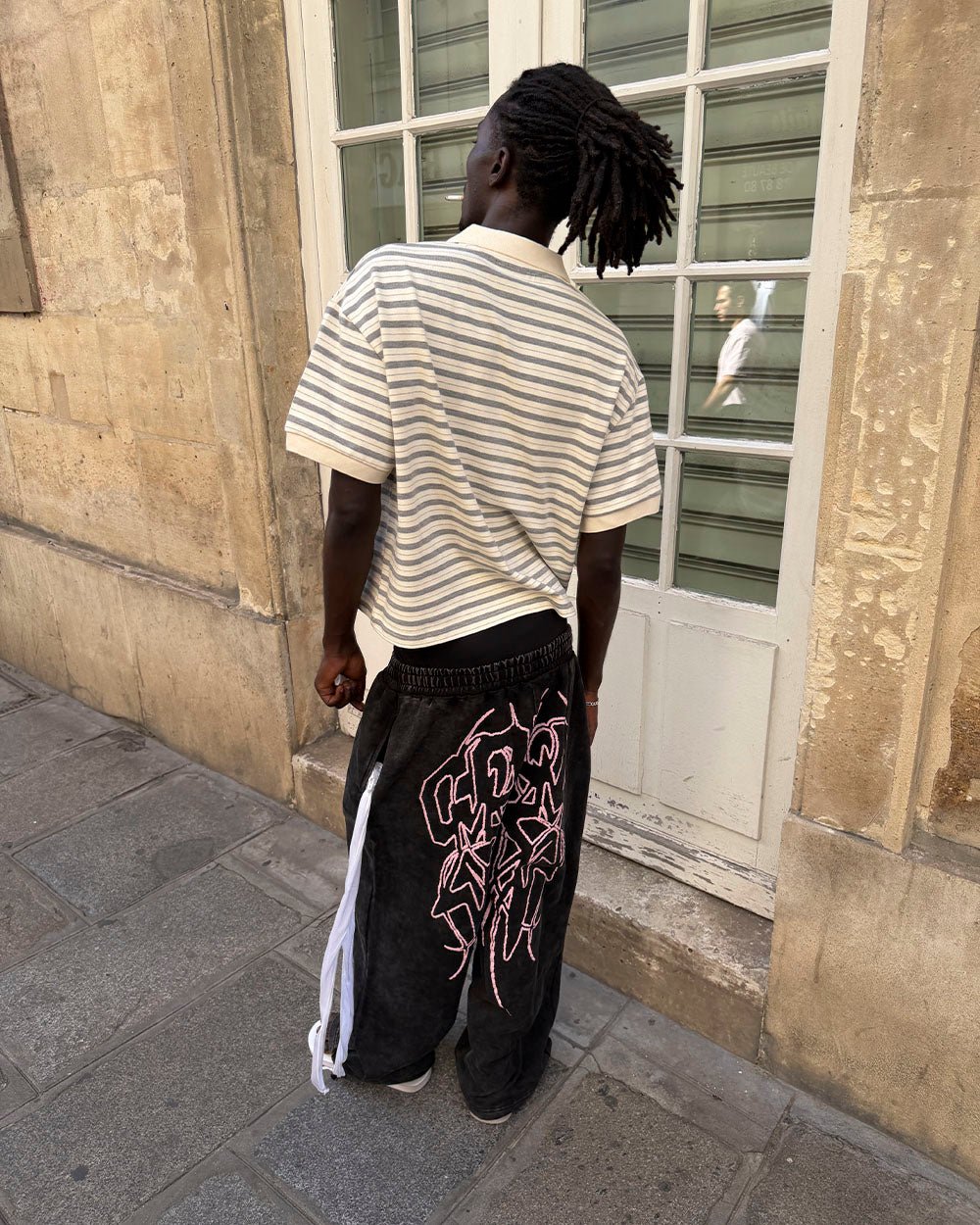 COURT FIELD KNIT POLO GREY - grey striped knit polo, street style shot - Cold Culture