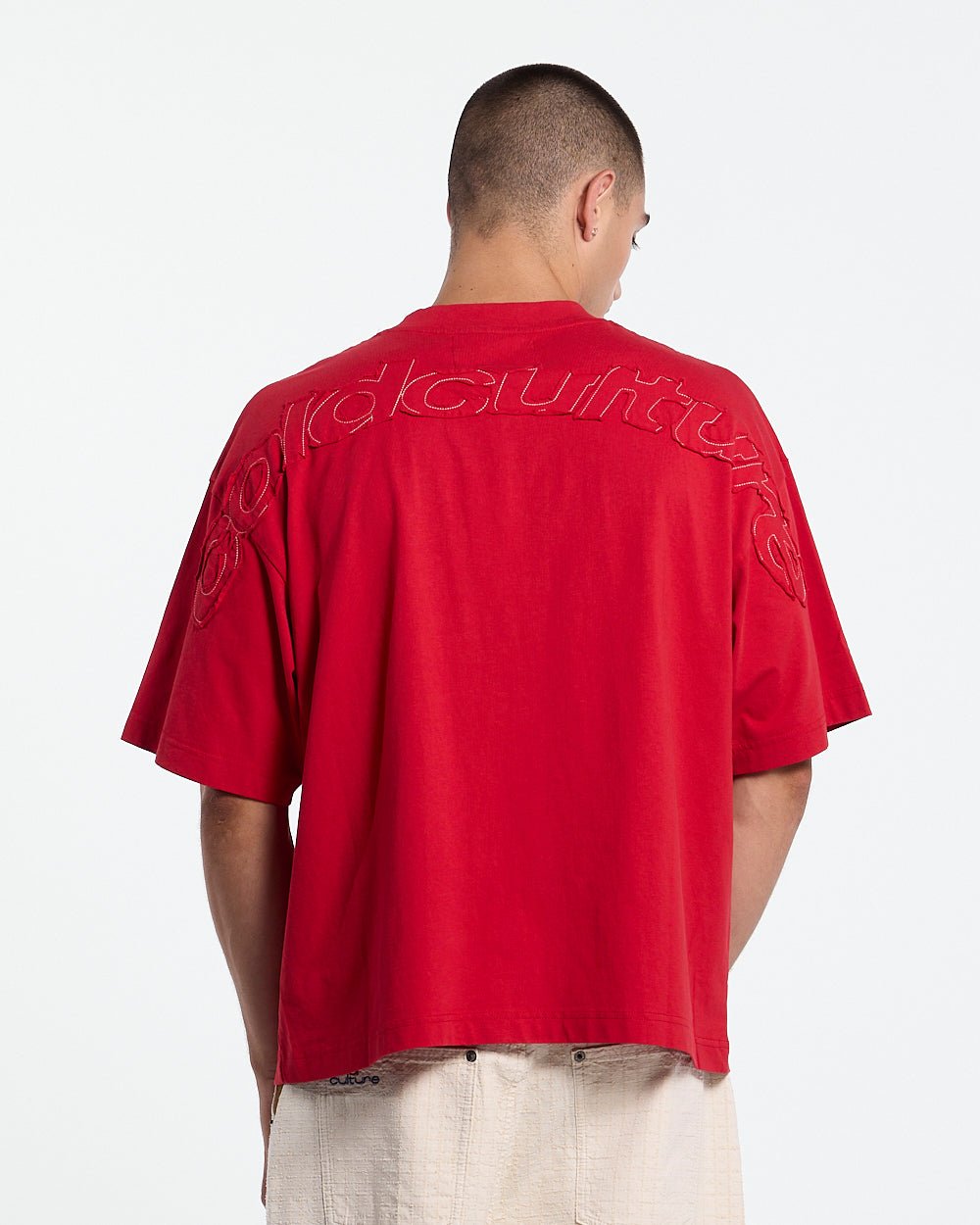 DISTRESS CURVED TEE RED - red distressed tee, back view on male model - Cold Culture