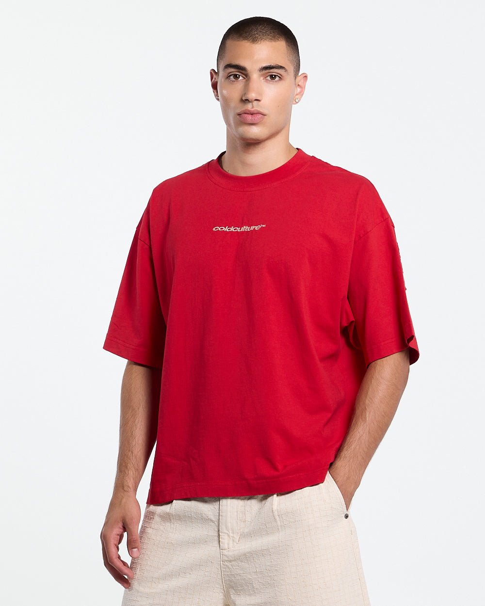 DISTRESS CURVED TEE RED - red distressed tee, front view on male model - Cold Culture