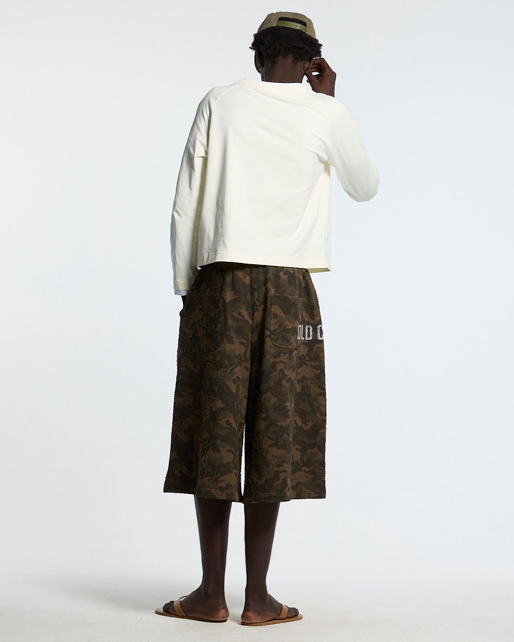 FRONT LINE JORTS GREEN - green camo shorts, back view on male model - Cold Culture
