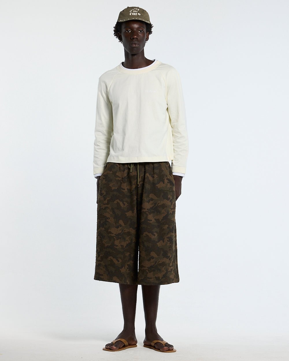 FRONT LINE JORTS GREEN - green camo shorts, front view on male model - Cold Culture
