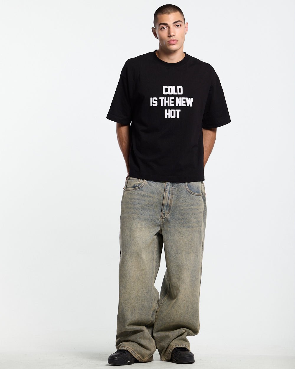 HOT TEE BLACK - black slogan print tee, front view on male model - Cold Culture