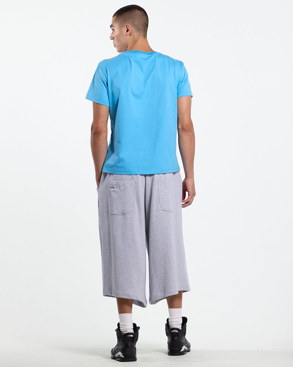 ICEY TEE BLUE - light blue graphic tee, back view on male model - Cold Culture