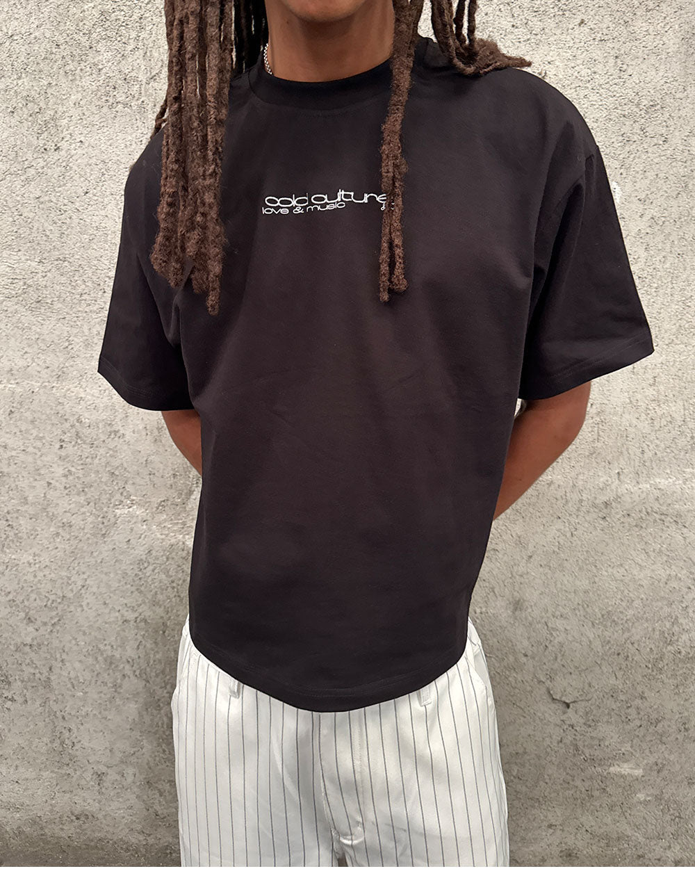 LOVEPODS TEE BLACK - black graphic print tee, on model close-up - Cold Culture