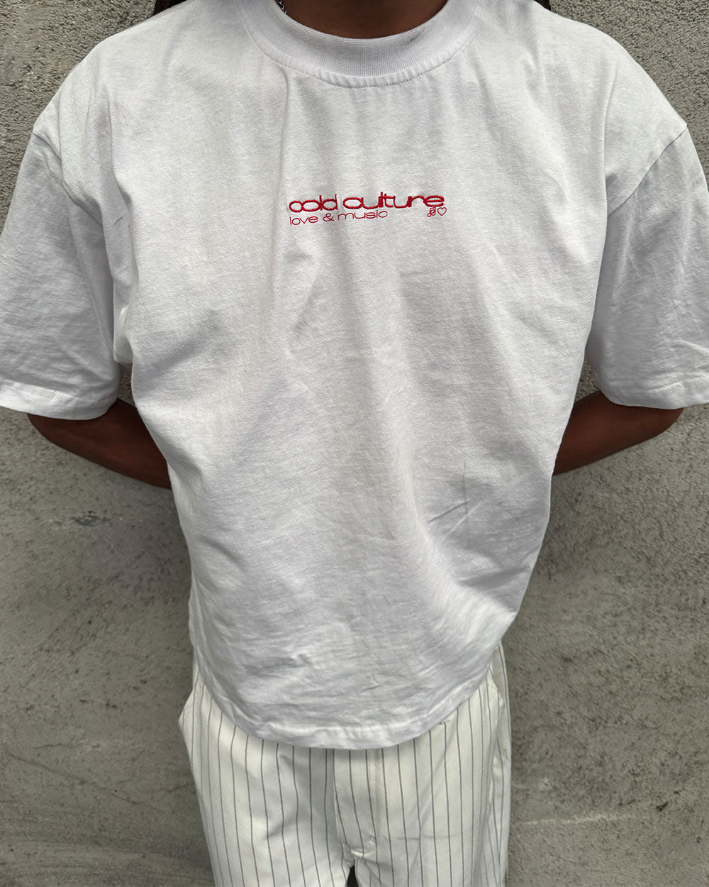 LOVEPODS TEE WHITE - white graphic print tee, on model close-up - Cold Culture
