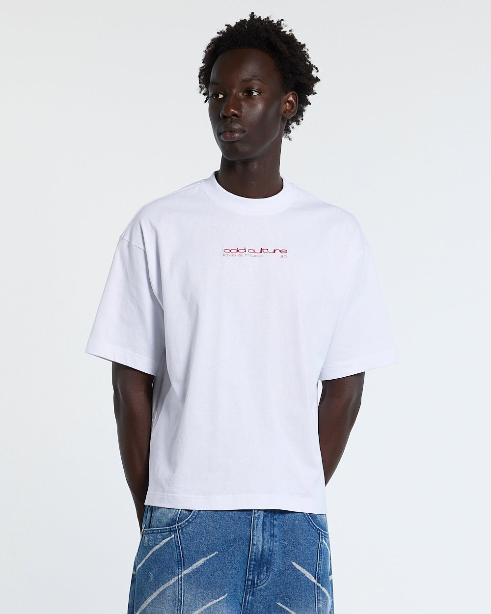 LOVEPODS TEE WHITE - white graphic print tee, front view on male model - Cold Culture
