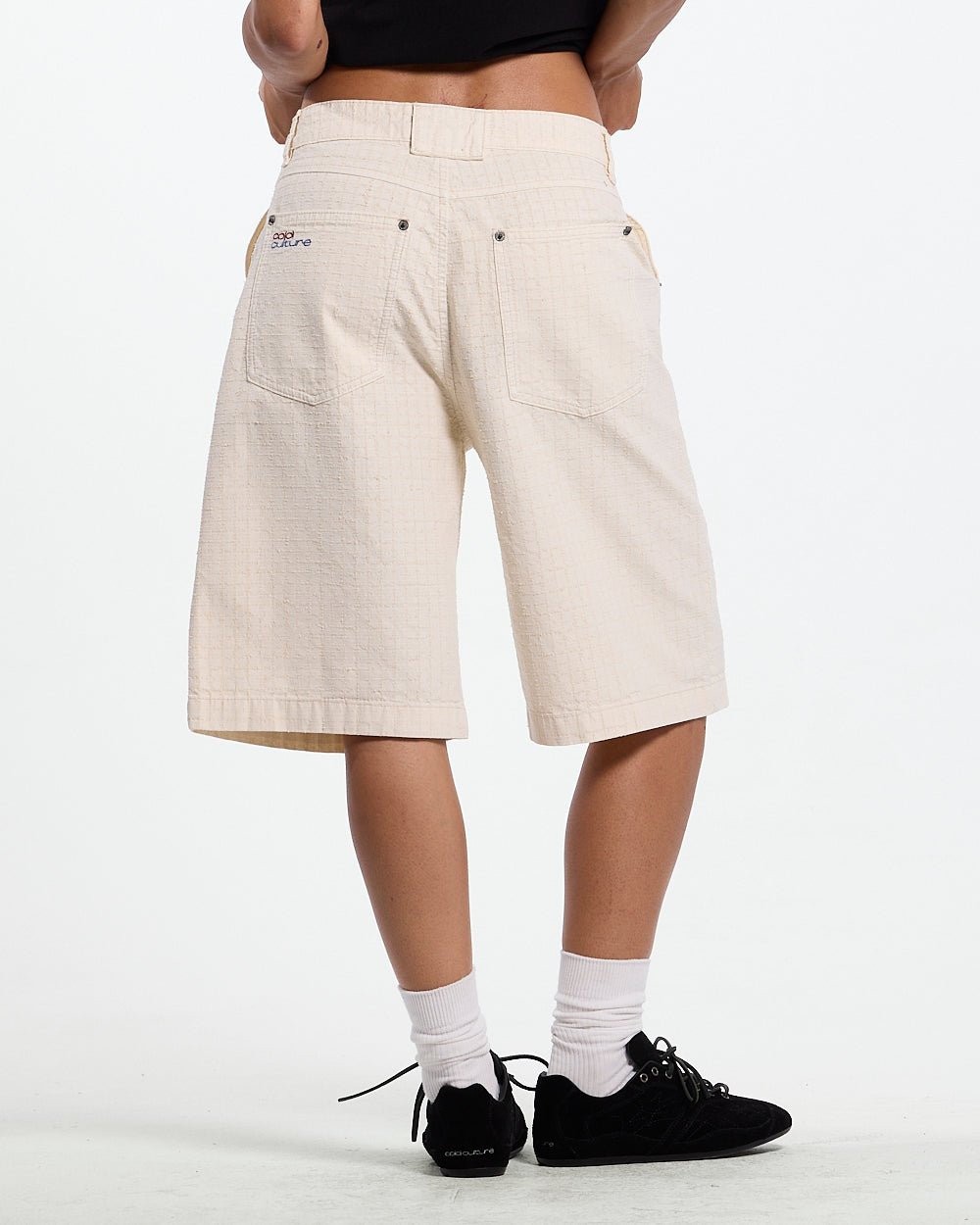NEEDLE PUNCH SHORT WHITE - off-white textured shorts, back view on female model - Cold Culture