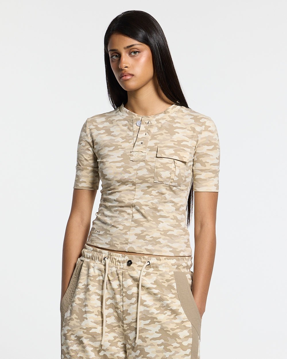 NEUTRAL FIELD BABY TEE CAMO - beige camo baby tee, front view on female model - Cold Culture