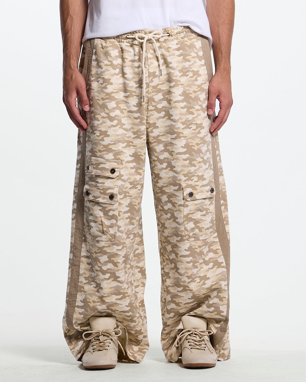 NEUTRAL FIELD SWEATPANTS CAMO - beige camo sweatpants, front view on male model - Cold Culture