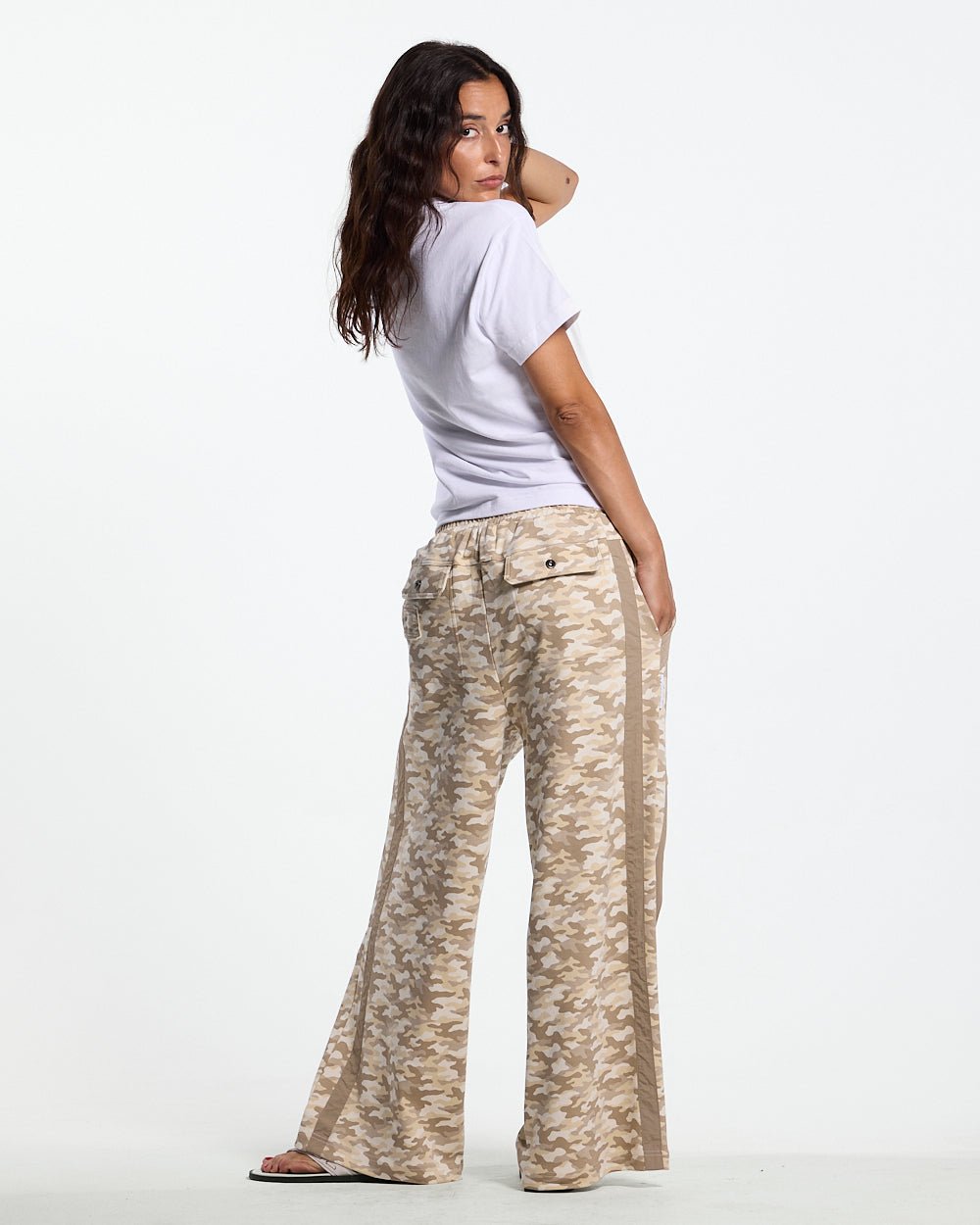 NEUTRAL FIELD SWEATPANTS CAMO - beige camo sweatpants, back view on female model - Cold Culture