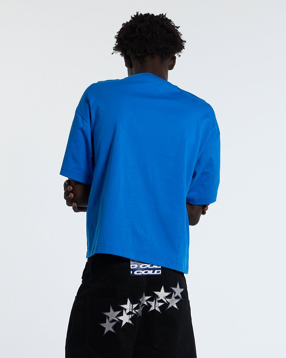OOPS! TEE BLUE - blue graphic print tee, back view on male model - Cold Culture
