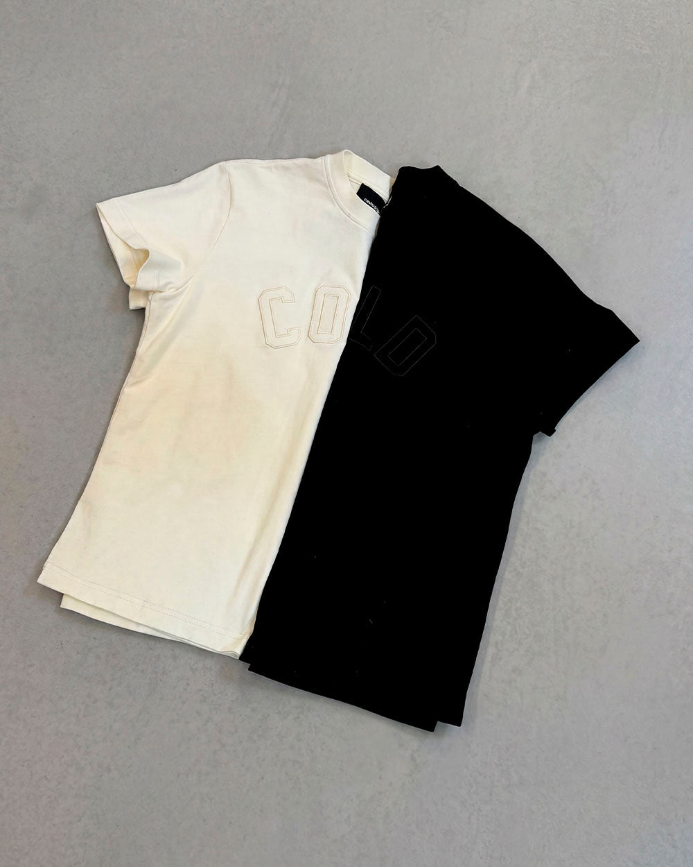 PIECES TEE BLACK - black applique tee, flat lay with matching pieces - Cold Culture