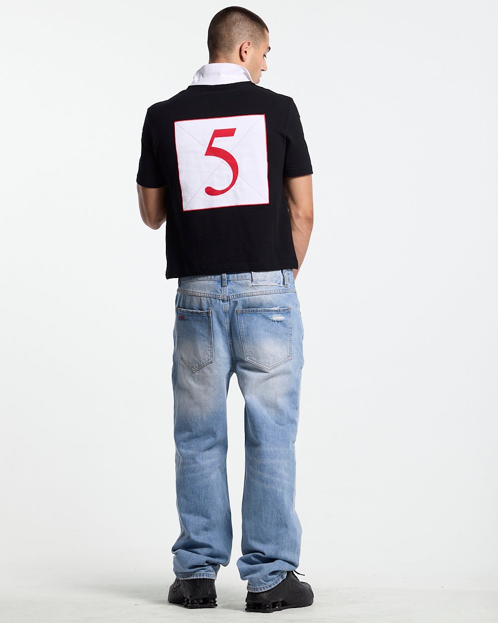 RIDING CLUB POLO BLACK - black embroidered polo shirt, back view on male model - Cold Culture