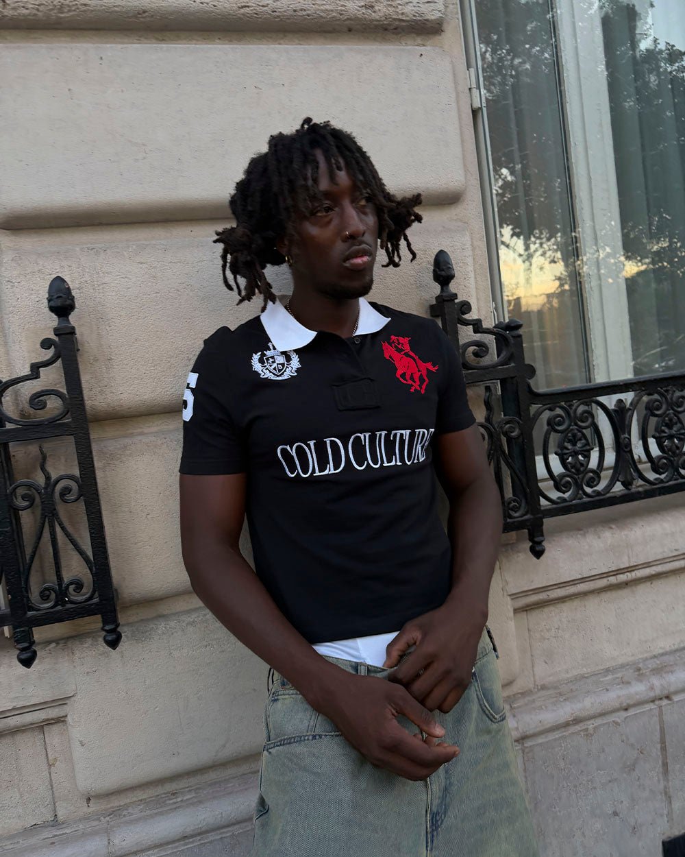 RIDING CLUB POLO BLACK - black embroidered polo shirt, street style shot - Cold Culture