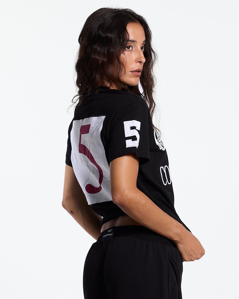 RIDING CLUB POLO BLACK - black embroidered polo shirt, back view on female model - Cold Culture