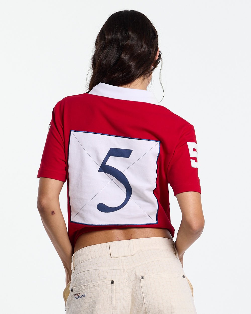 RIDING CLUB POLO RED - red embroidered polo shirt, back view on female model - Cold Culture