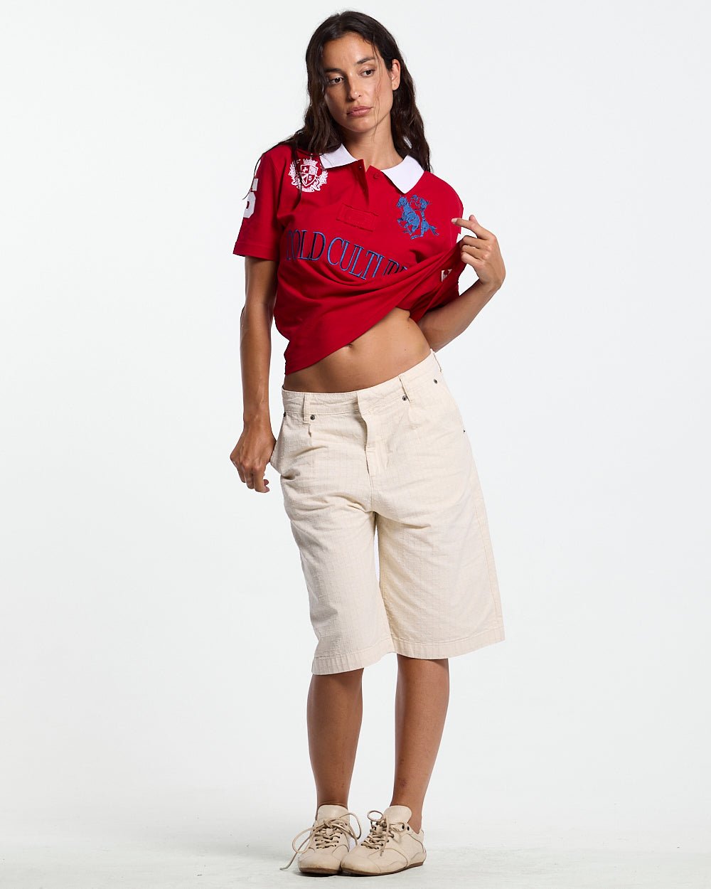 RIDING CLUB POLO RED - red embroidered polo shirt, front view on female model - Cold Culture