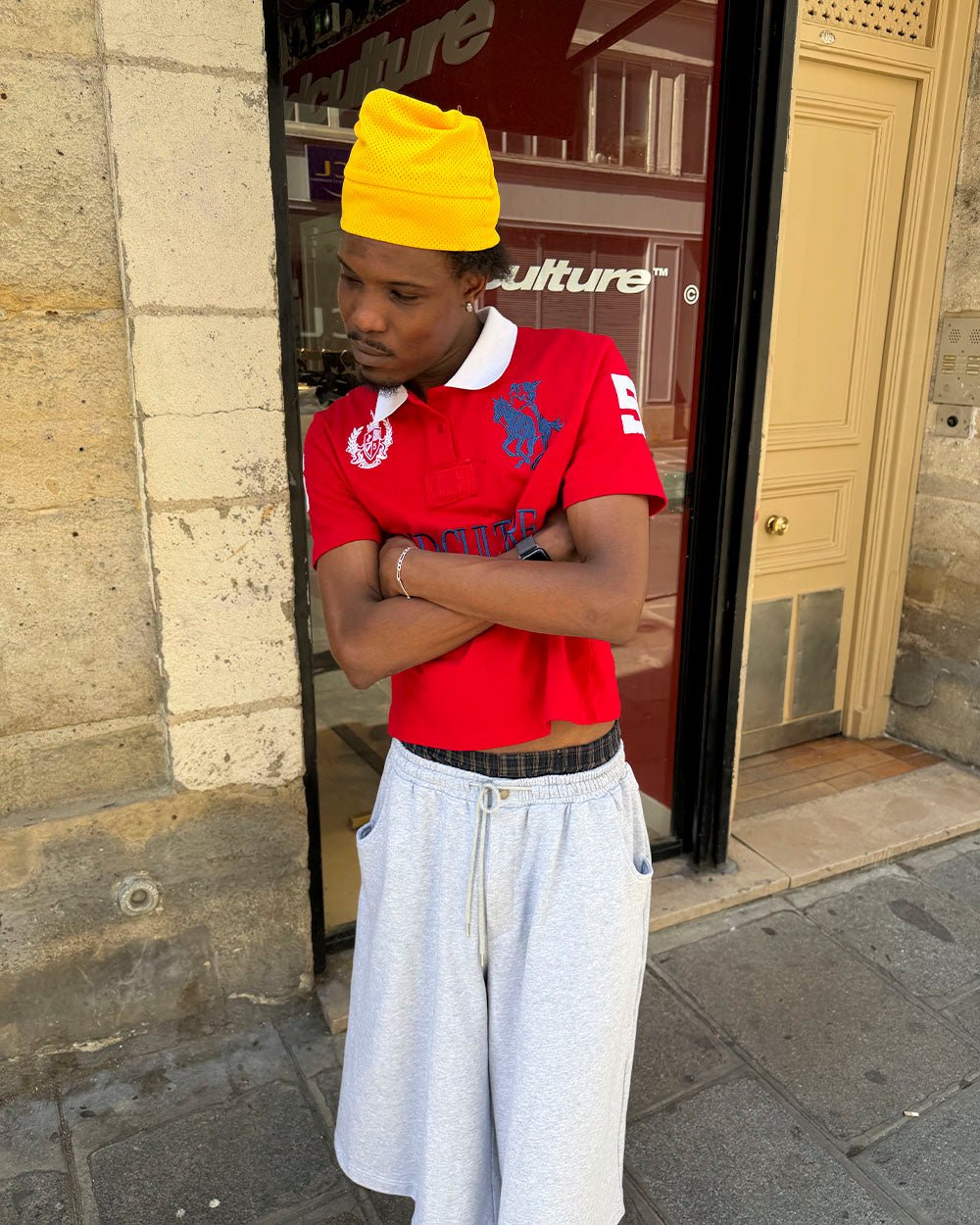 RIDING CLUB POLO RED - red embroidered polo shirt, street style shot - Cold Culture