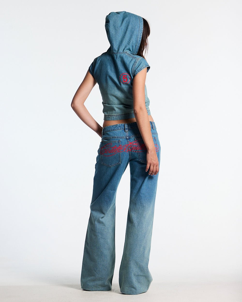 SIGHT ZIP BABY TEE DENIM - washed denim zip tee, back view on female model - Cold Culture