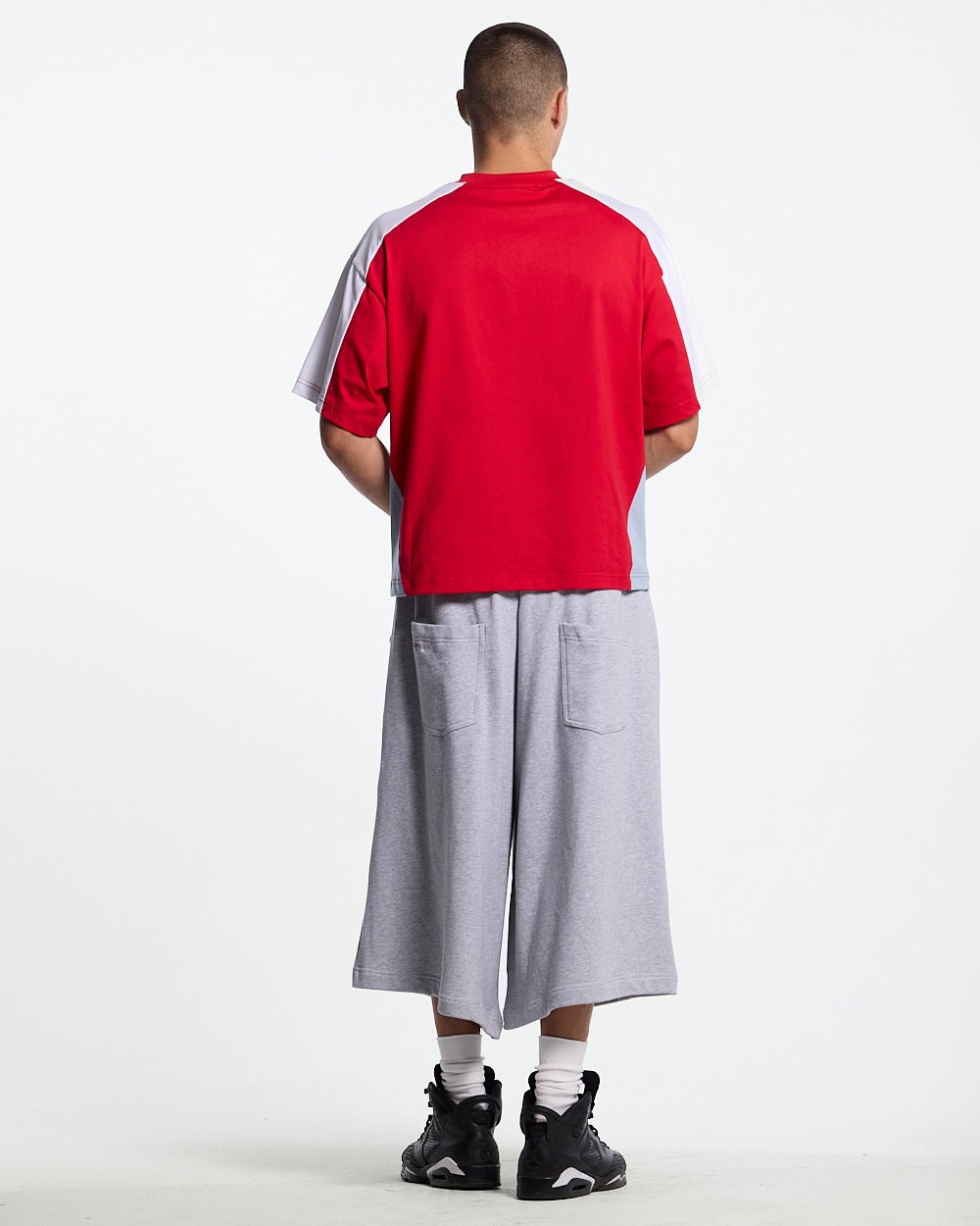 SNAPPED V2 JORTS HEATHER GREY - heather grey oversized sweat shorts, back view on male model - Cold Culture