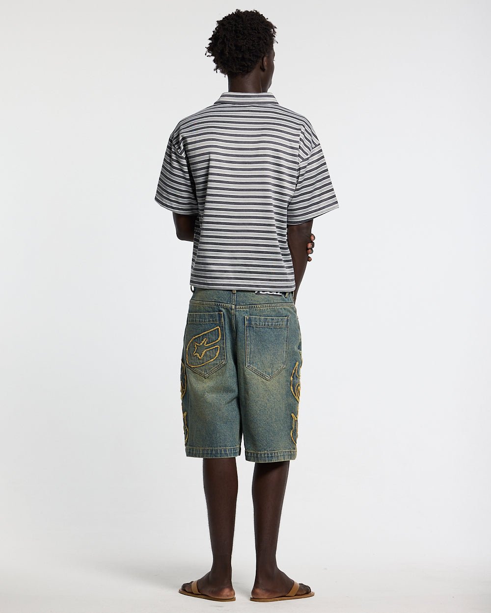 TRIBAL DISTRESSED V2 SHORTS GREEN - green washed denim shorts, back view on male model - Cold Culture