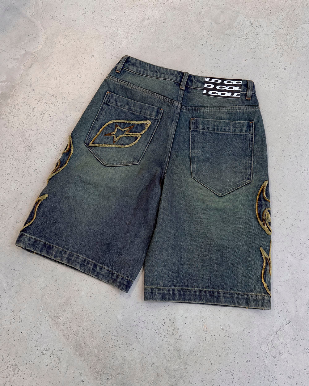 TRIBAL DISTRESSED V2 SHORTS GREEN - green washed denim shorts, flat lay - Cold Culture