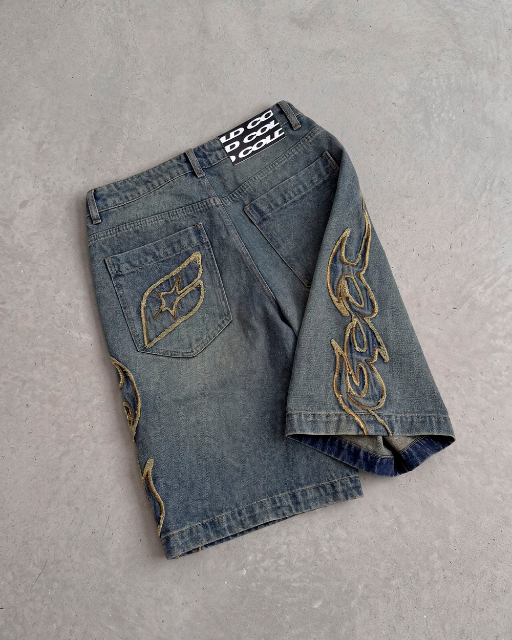 TRIBAL DISTRESSED V2 SHORTS GREEN - green washed denim shorts, flat lay - Cold Culture
