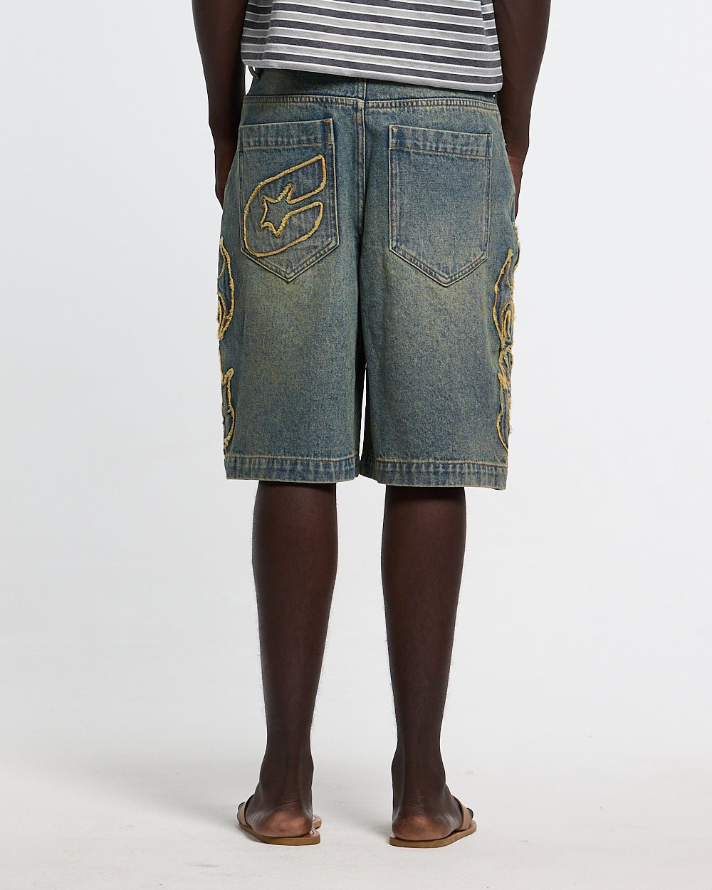 TRIBAL DISTRESSED V2 SHORTS GREEN - green washed denim shorts, back view on male model - Cold Culture
