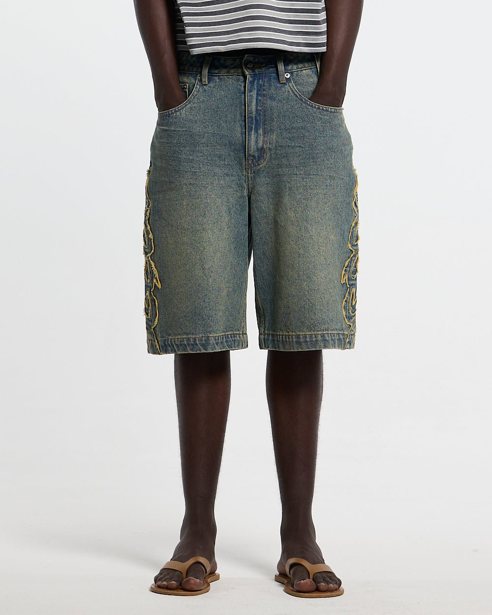 TRIBAL DISTRESSED V2 SHORTS GREEN - green washed denim shorts, front view on male model - Cold Culture