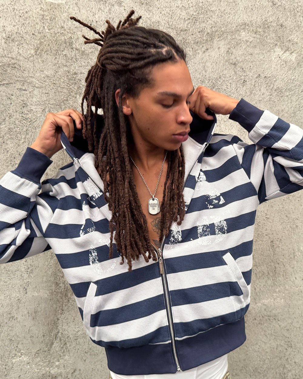UNTRUE WAFFLE REVERSIBLE ZIP HOODIE BLUE - navy striped reversible zip-up hoodie, street style shot - Cold Culture