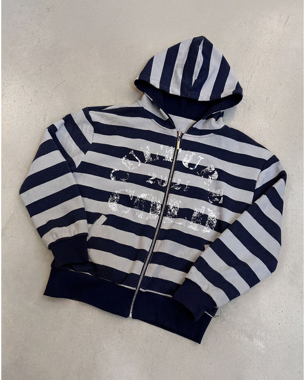 UNTRUE WAFFLE REVERSIBLE ZIP HOODIE BLUE - navy striped reversible zip-up hoodie, flat lay - Cold Culture