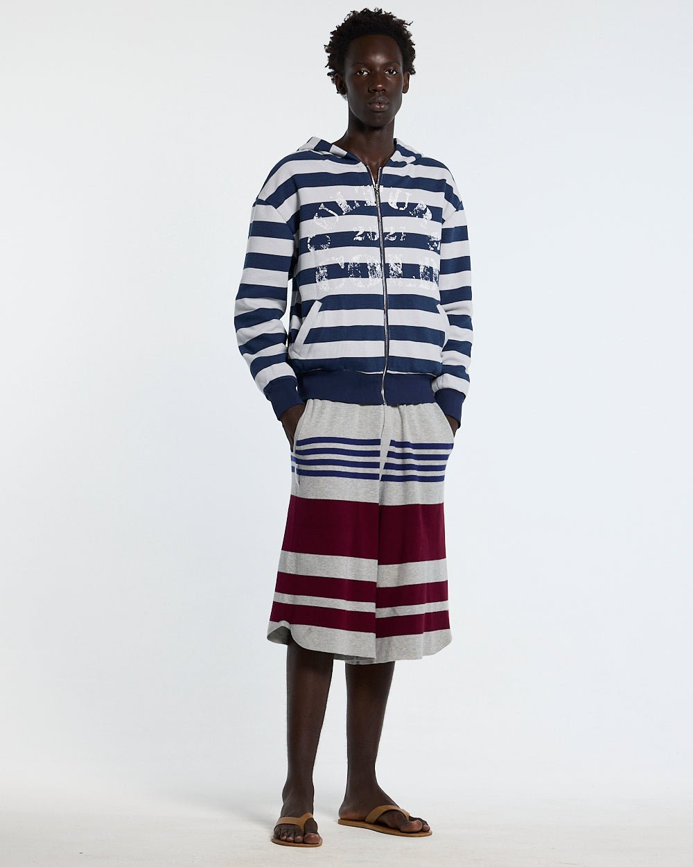 UNTRUE WAFFLE REVERSIBLE ZIP HOODIE BLUE - navy striped reversible zip-up hoodie, front view on male model - Cold Culture