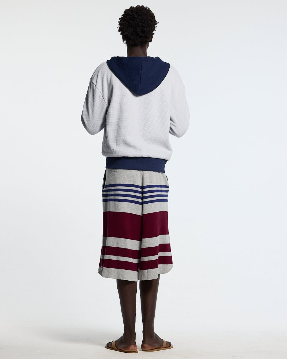 UNTRUE WAFFLE REVERSIBLE ZIP HOODIE BLUE - navy striped reversible zip-up hoodie, back view on male model - Cold Culture