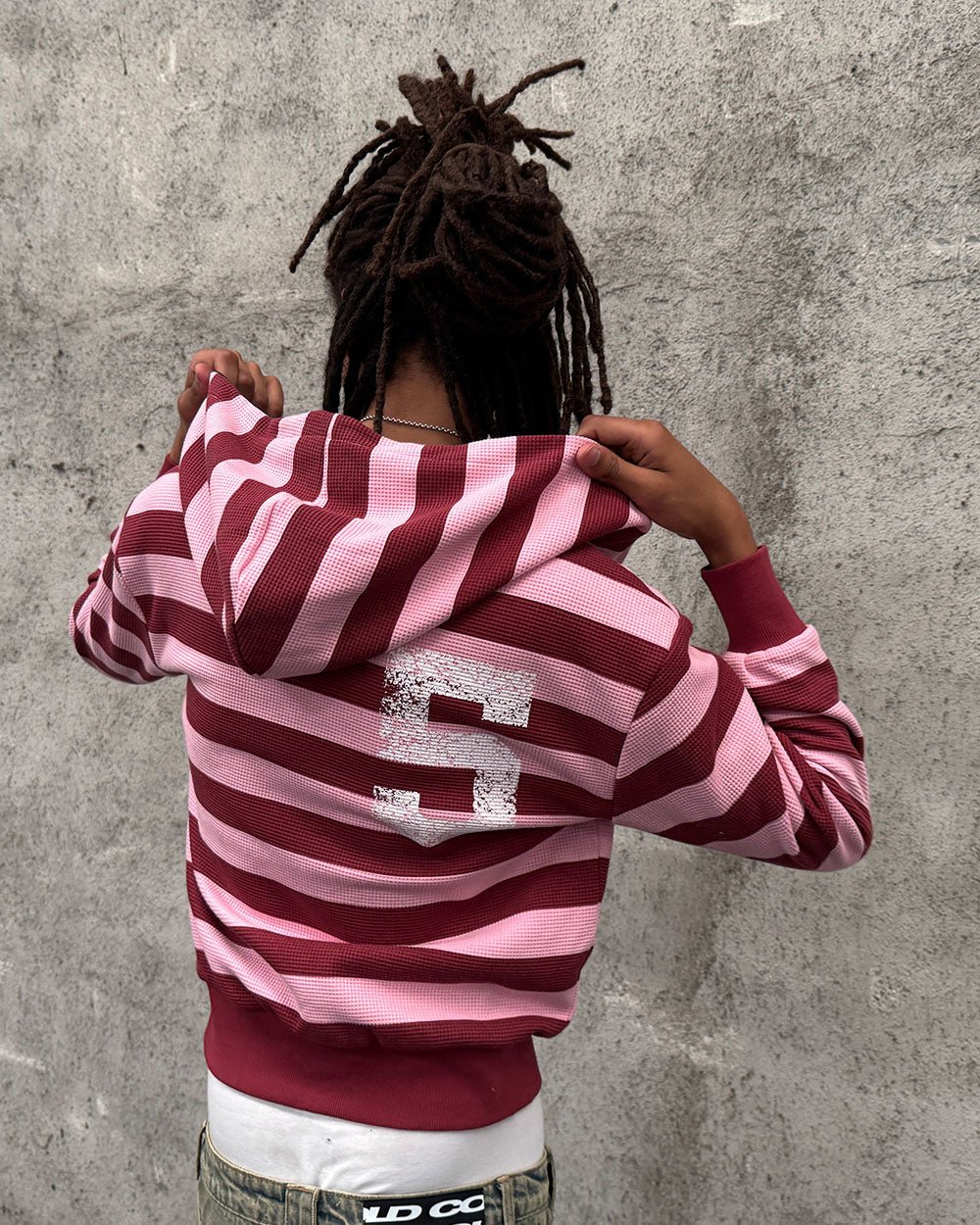 UNTRUE WAFFLE REVERSIBLE ZIP HOODIE PINK - pink striped reversible zip-up hoodie, street style shot - Cold Culture