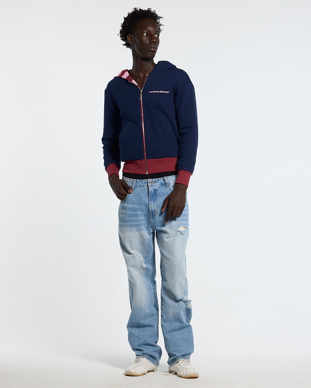 UNTRUE WAFFLE REVERSIBLE ZIP HOODIE PINK - pink striped reversible zip-up hoodie, front view on male model - Cold Culture