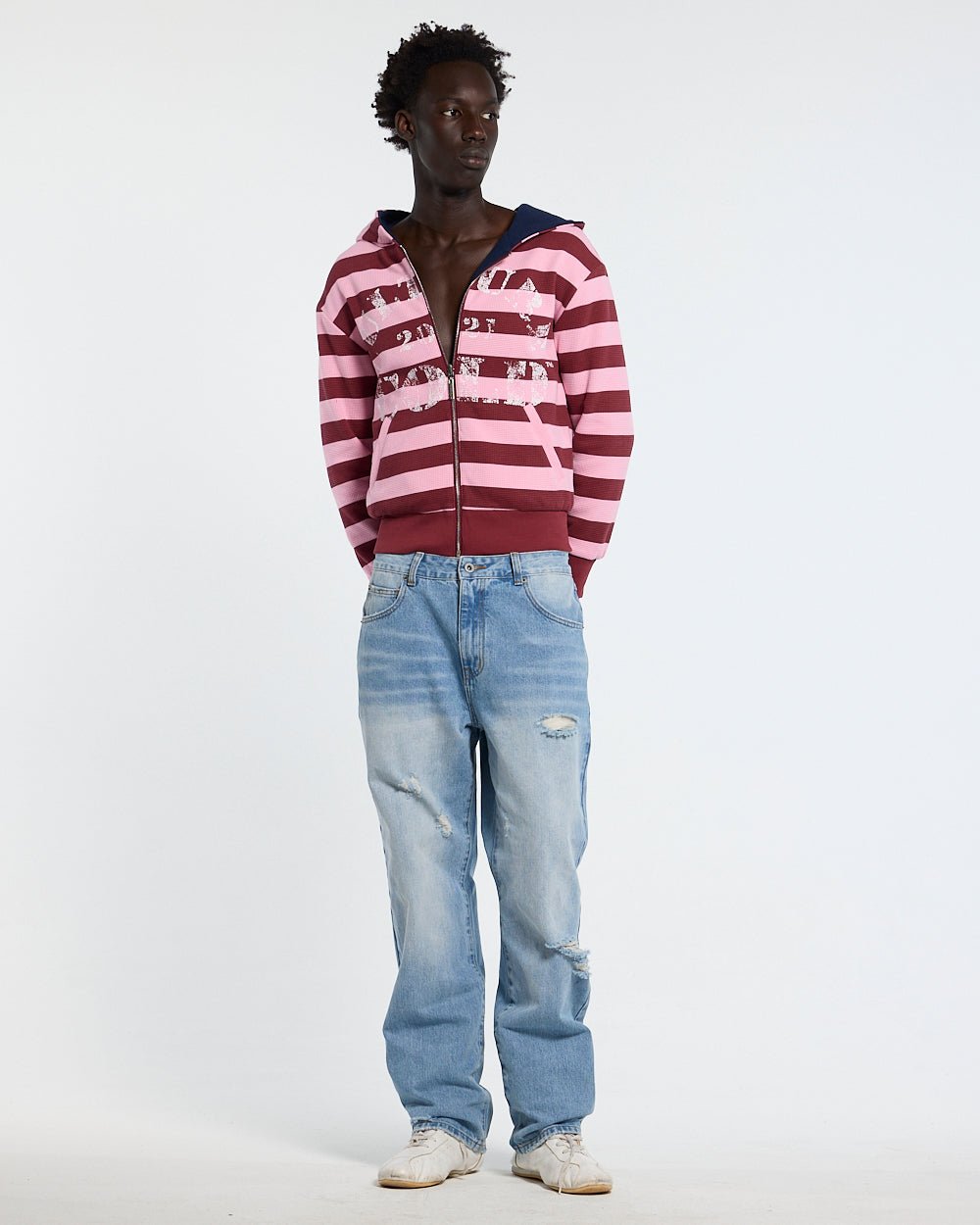 UNTRUE WAFFLE REVERSIBLE ZIP HOODIE PINK - pink striped reversible zip-up hoodie, front view on male model - Cold Culture