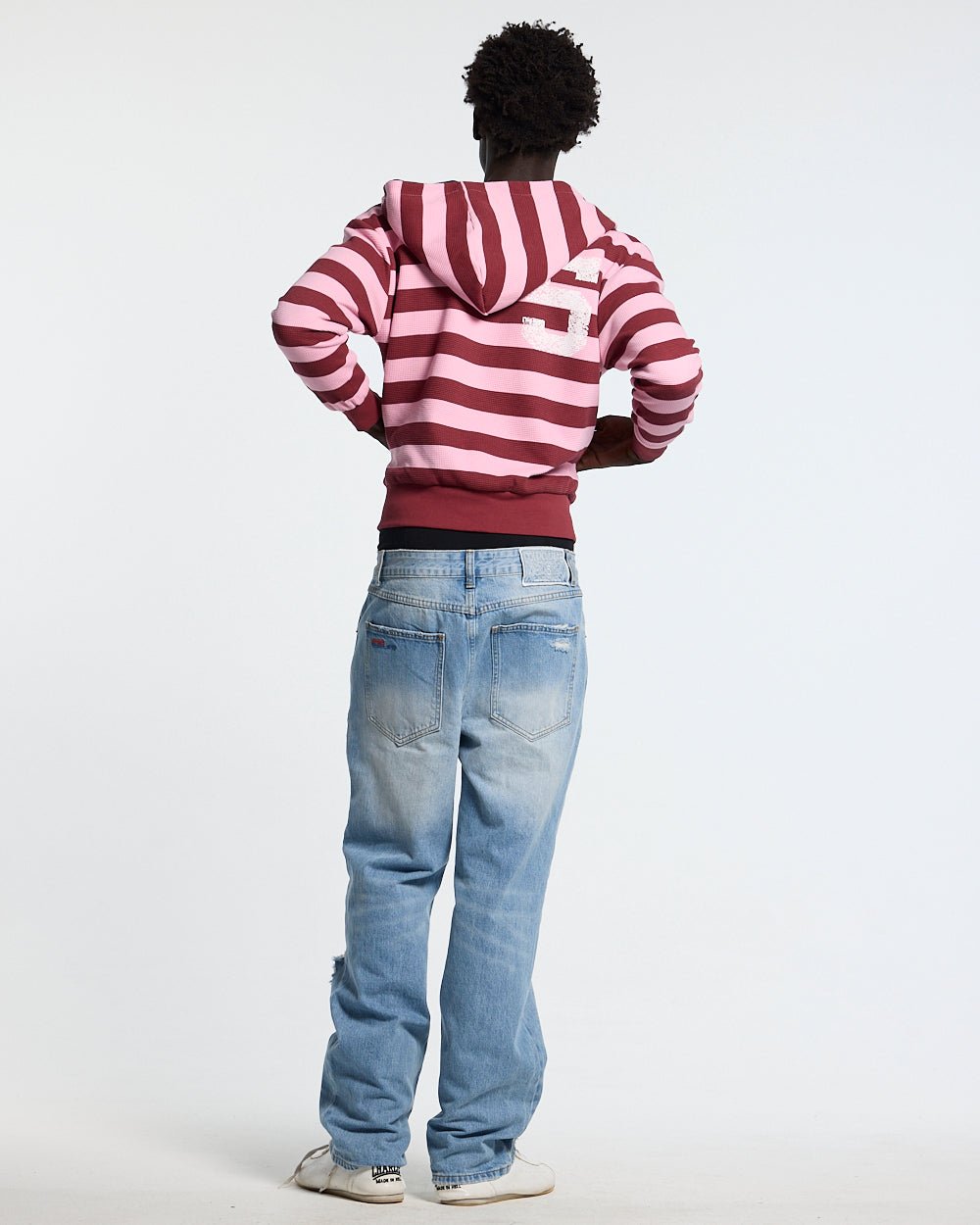 UNTRUE WAFFLE REVERSIBLE ZIP HOODIE PINK - pink striped reversible zip-up hoodie, back view on male model - Cold Culture