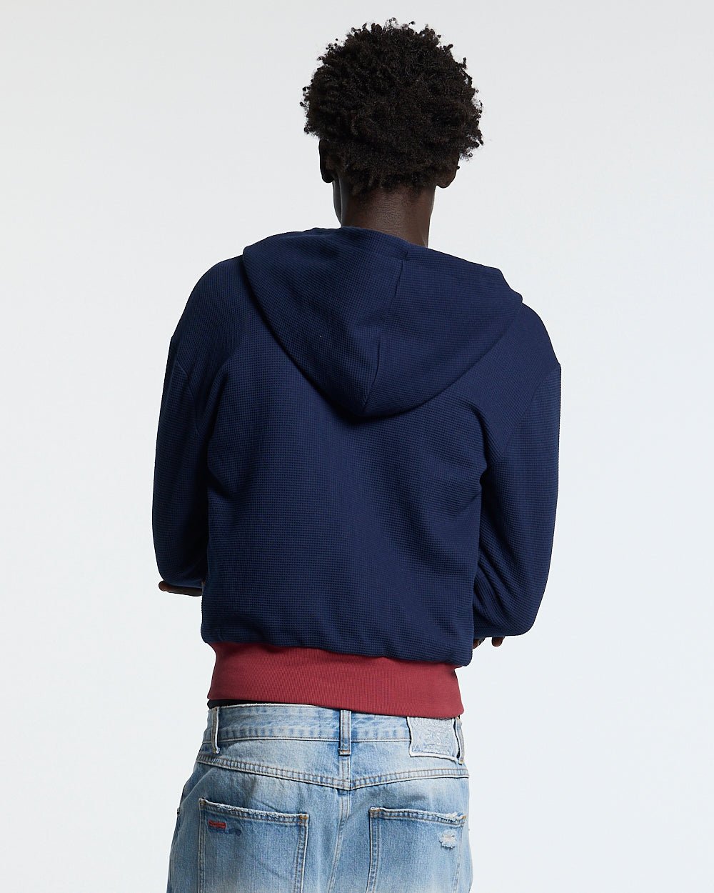 UNTRUE WAFFLE REVERSIBLE ZIP HOODIE PINK - pink striped reversible zip-up hoodie, back view on male model - Cold Culture