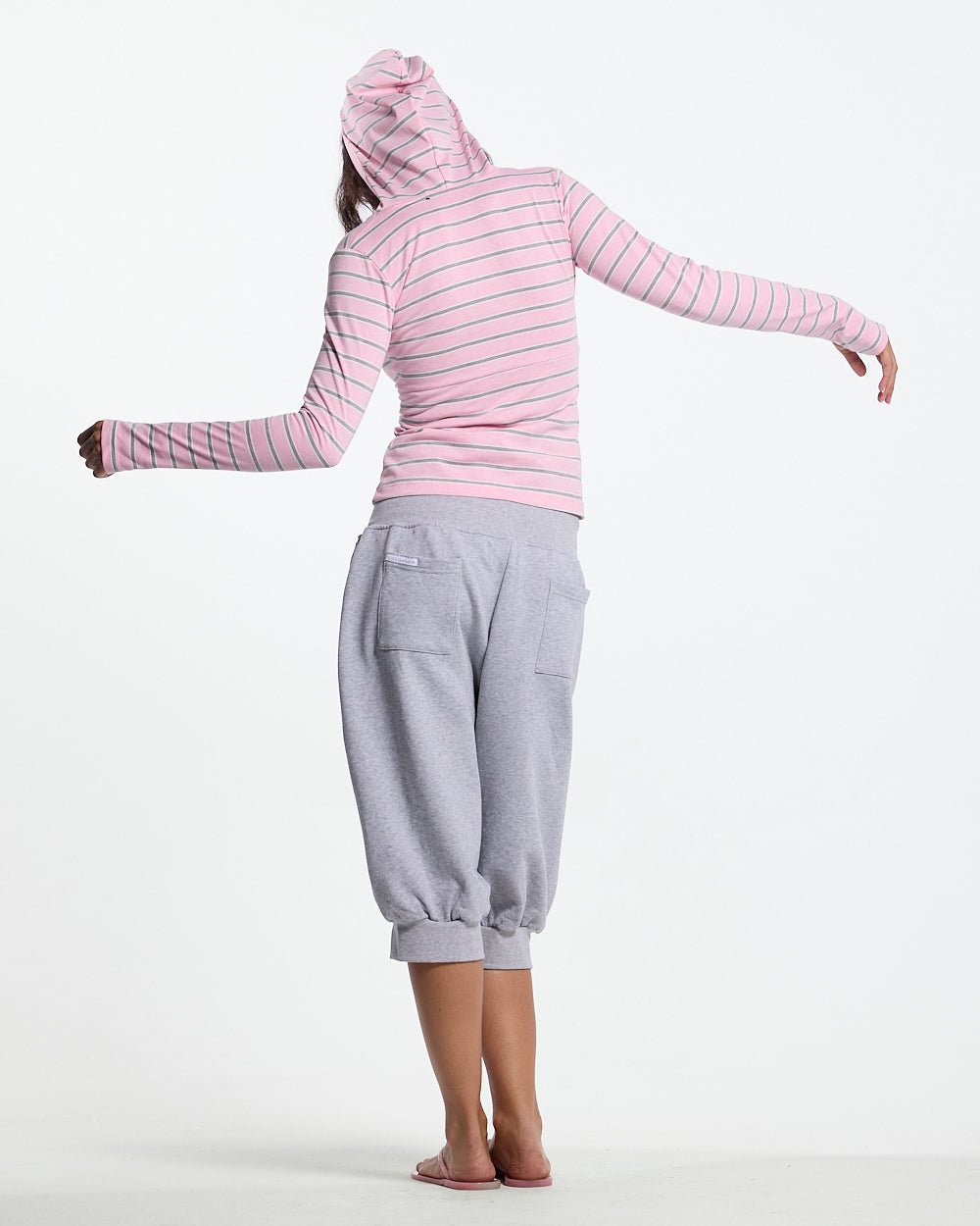 WHIPPED CREAM ZIP LONGSLEEVE PINK - pink striped zip longsleeve, back view on female model - Cold Culture