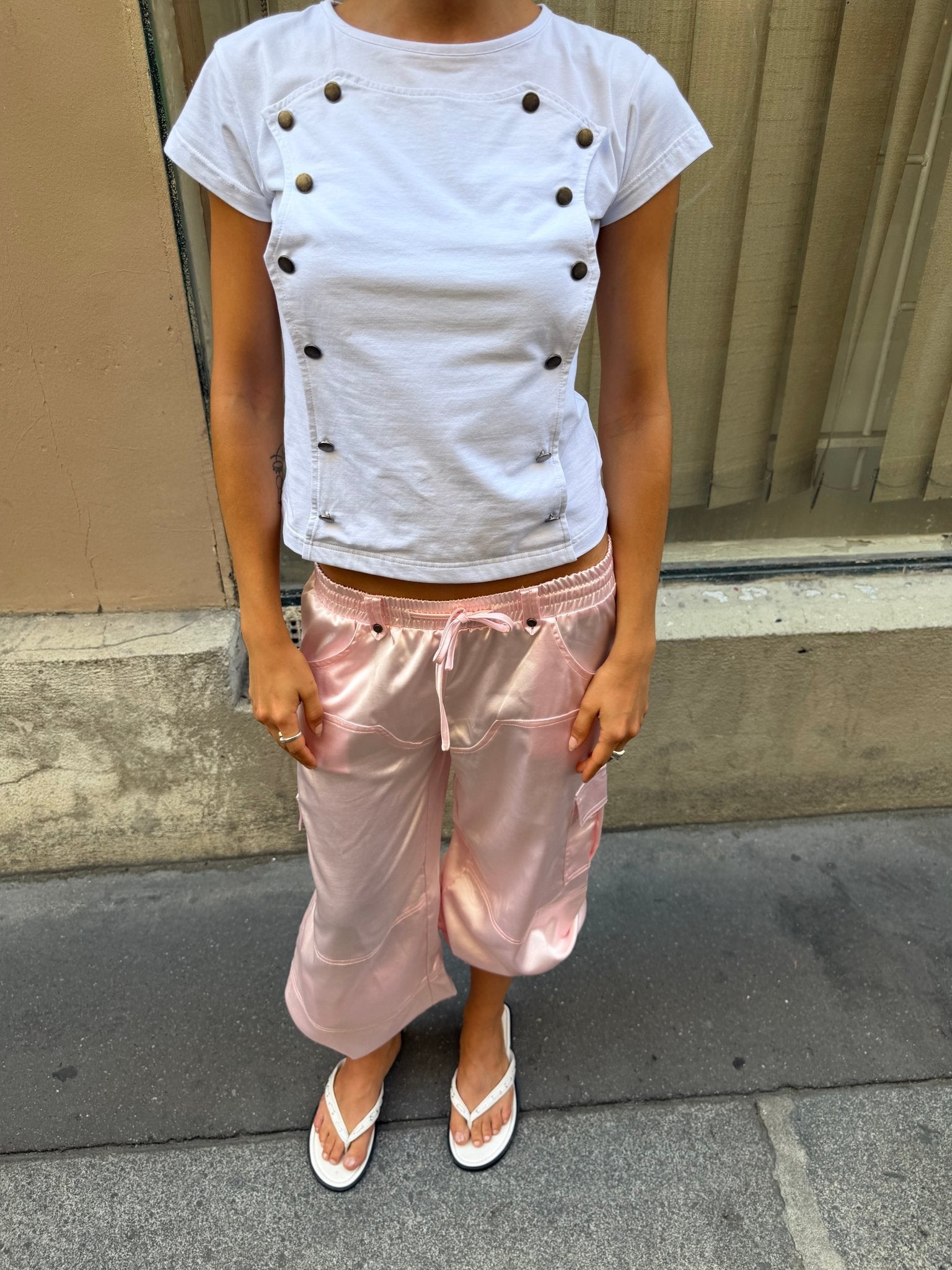 WHISK BABY TEE WHITE - white studded baby tee, street style shot - Cold Culture