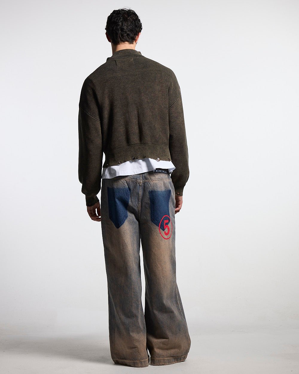 DISTRESS CURVED ZIP KNIT BLACK