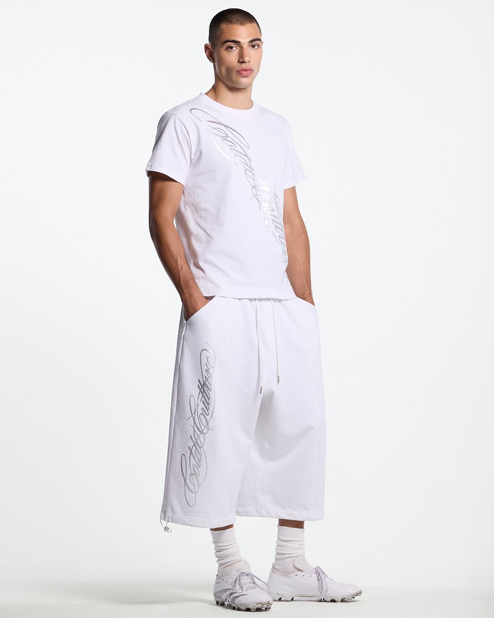 ICON TEE WHITE - white graphic print tee, front view on male model - Cold Culture