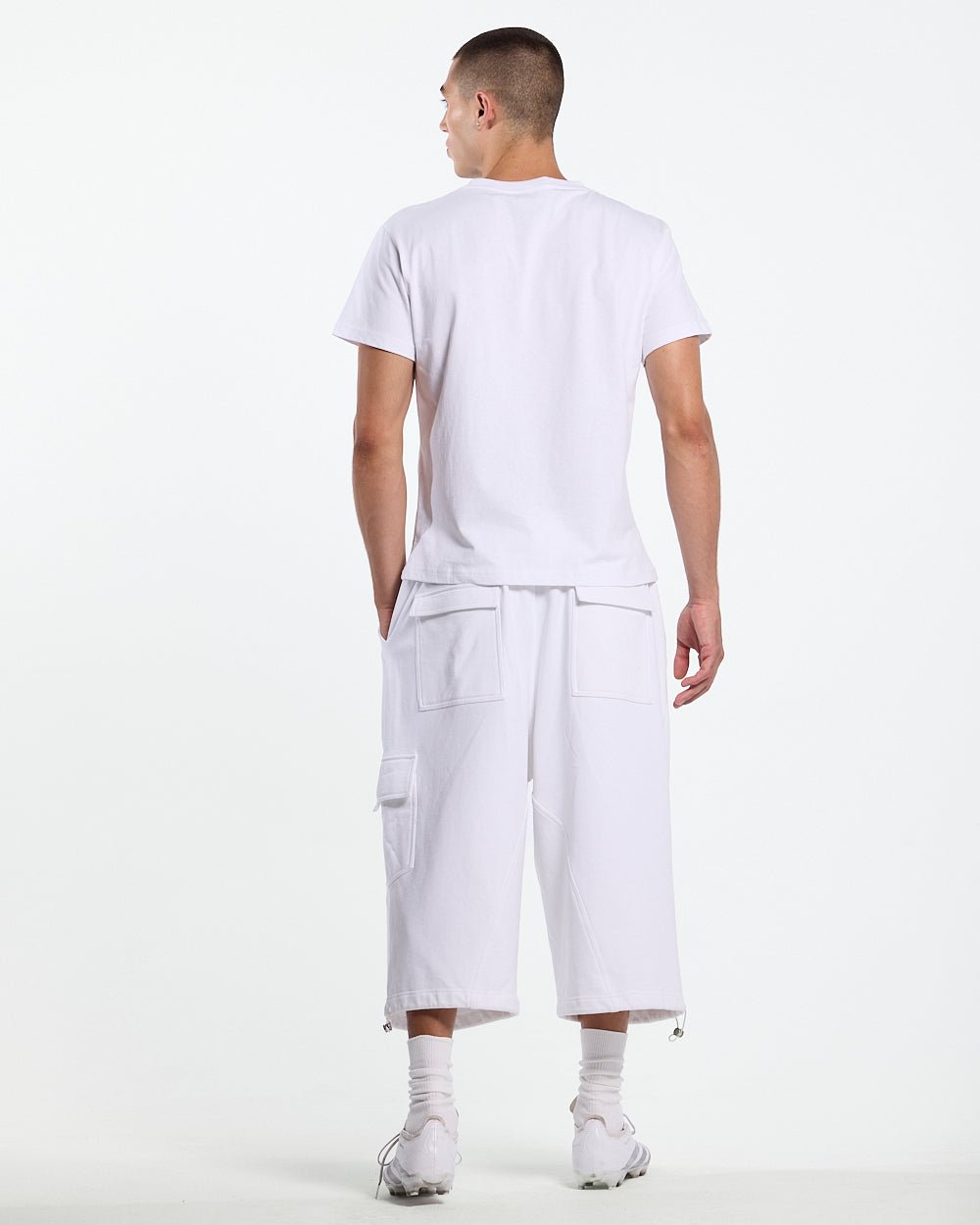 ICON TEE WHITE - white graphic print tee, back view on male model - Cold Culture